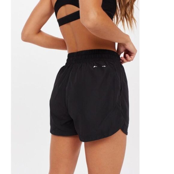 NEW WITH TAGS WOMEN’S BLACK THE UPSIDE LINED RUN 2” SHORTS SIZE 10/LARGE - Picture 1 of 8